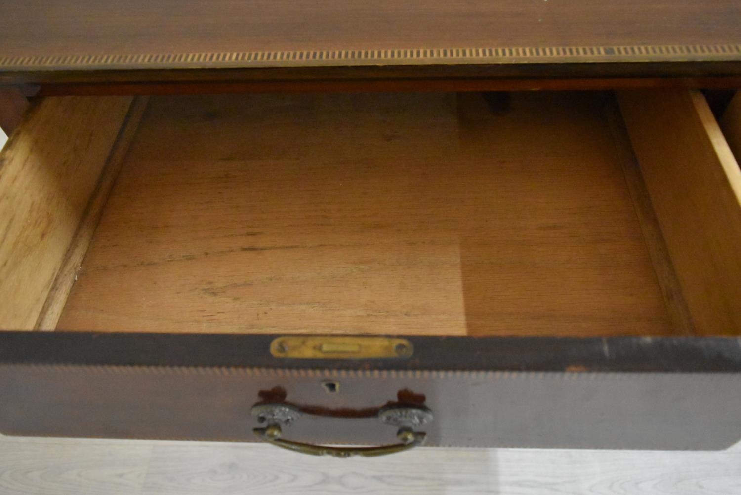 An Edwardian inlaid mahogany two drawer hall table raised on tapering supports terminating in pad - Image 7 of 14