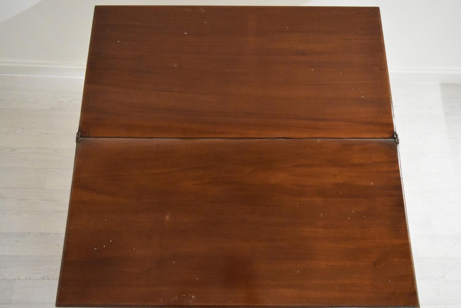 A George III mahogany rectangular fold over table raised on square supports. H.75.5 W.92.5 D.45. - Image 10 of 11