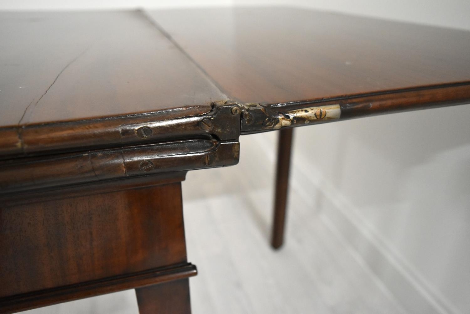 A George III mahogany rectangular fold over table raised on square supports. H.75.5 W.92.5 D.45. - Image 8 of 11