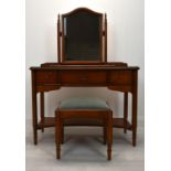 A contemporary mahogany three piece bedroom set to include dressing table mirror, three drawer
