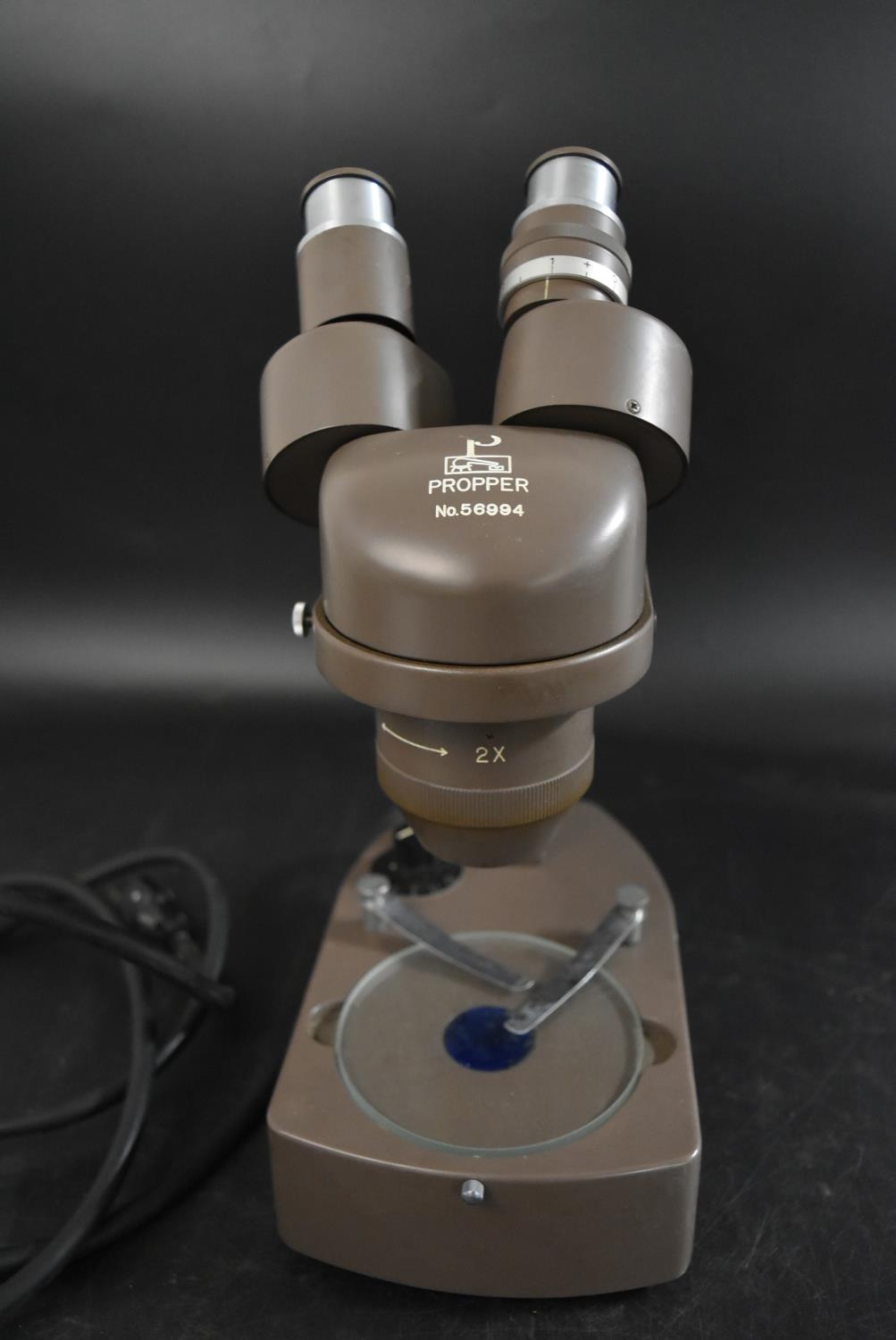 A mid 20th century electric microscope by Propper No. 56994. H.31cm