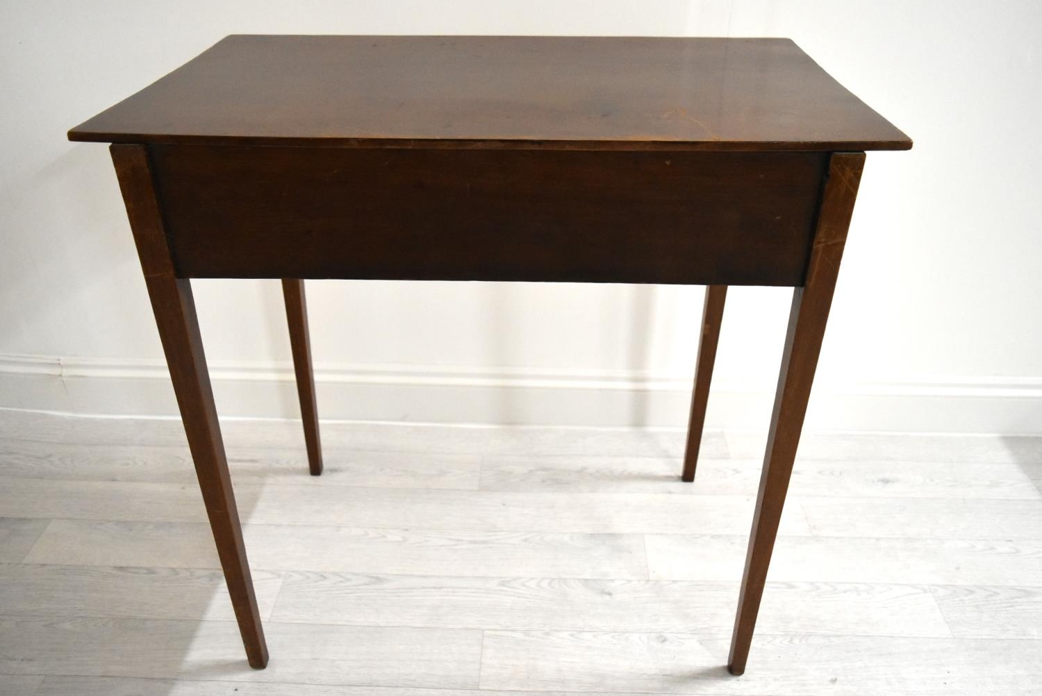 An Edwardian mahogany single drawer hall table raised on square tapering supports. H.76 W.77.5 D. - Image 4 of 7