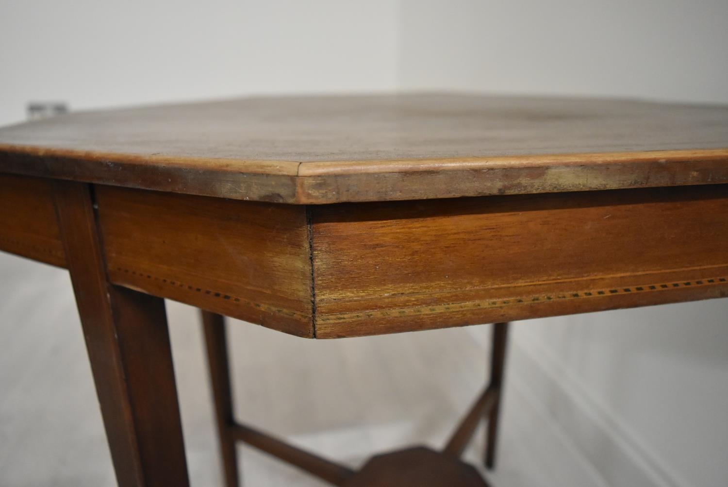 An Edwardian mahogany octagonal occasional table on tapering supports united by stretcher. H.68.5 - Image 5 of 17
