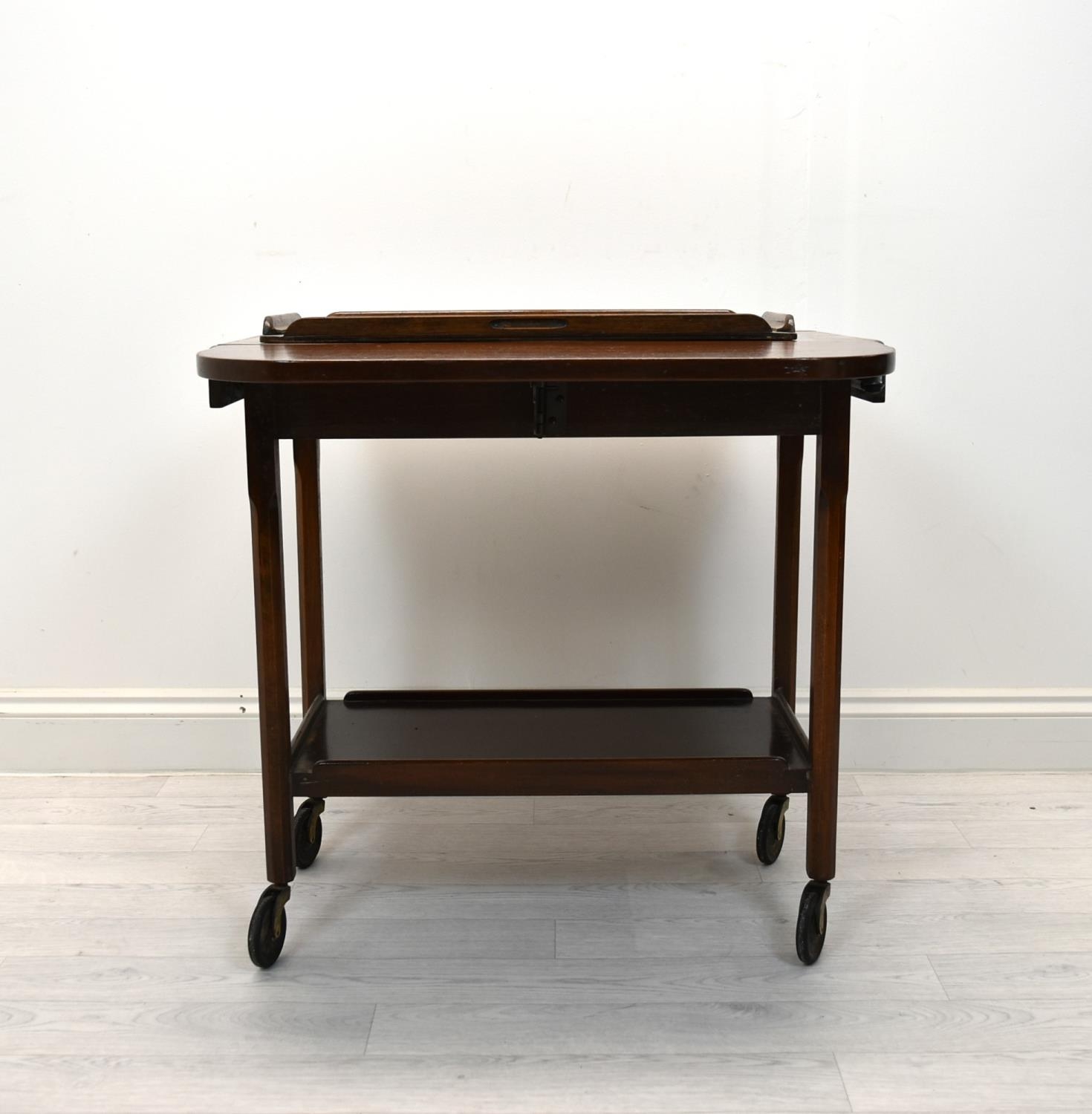 A 20th century stained mahogany drop flap drinks trolley with separate butlers tray together with an - Image 3 of 6