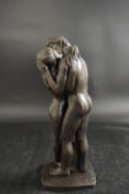 A contemporary patinated bronzed figure group of Adam and Eve raised on shaped plinth base. H.35cm