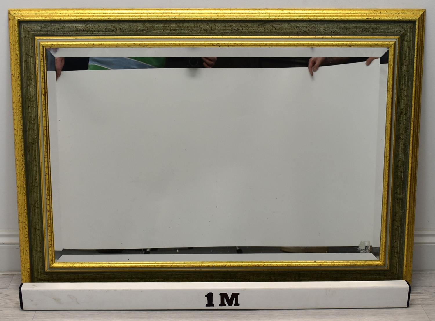 A contemporary gilt framed rectangular wall mirror. H.74 W.104cm - Image 2 of 3