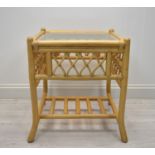 A contemporary bamboo framed glass topped conservatory table. H.59 W.51 D.51cm