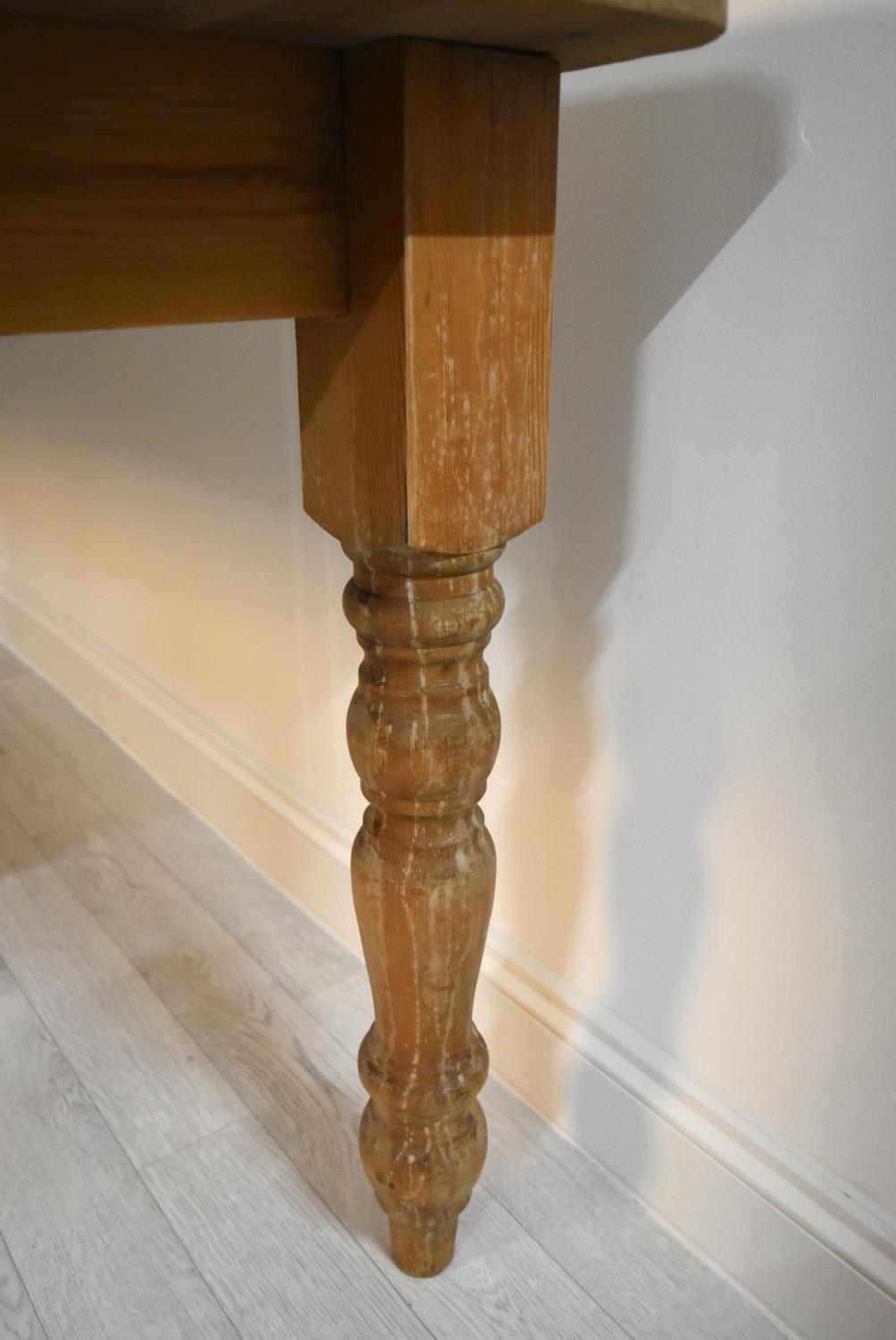 A rectangular pine farmhouse style kitchen table raised on turned supports. H.77 W.183 D.92cm - Image 5 of 6