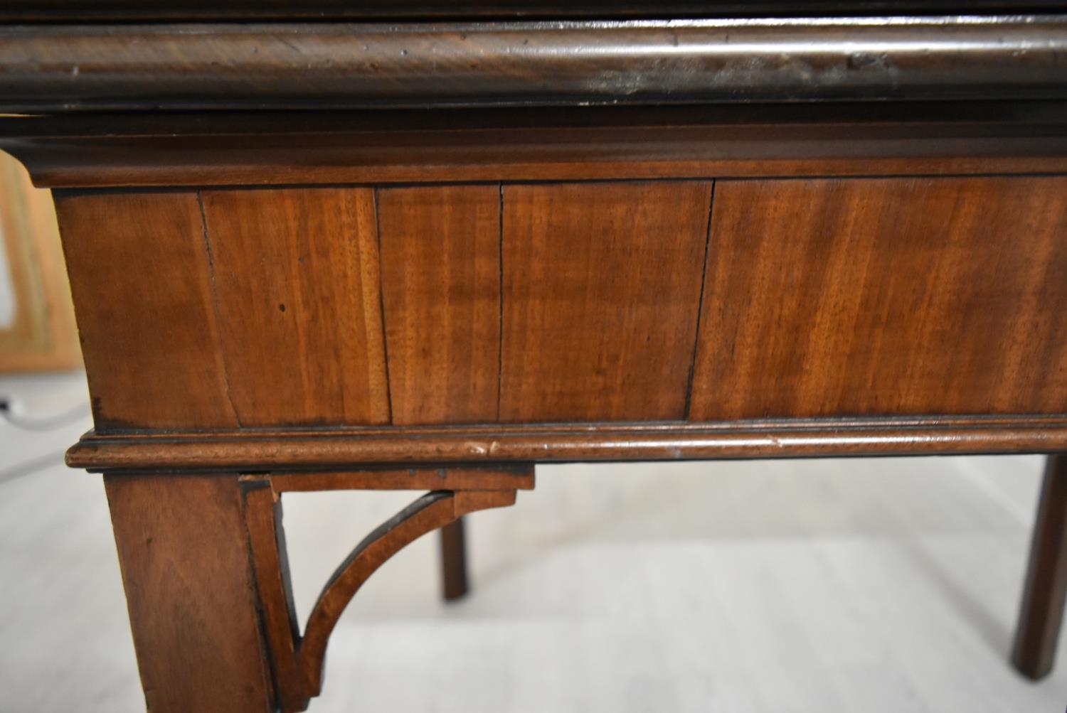 A George III mahogany rectangular fold over table raised on square supports. H.75.5 W.92.5 D.45. - Image 7 of 11