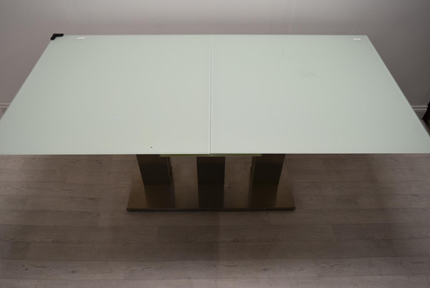 A contemporary extending glass dining table on brushed metal base. H.76 W.221 D.90cm - Image 14 of 21