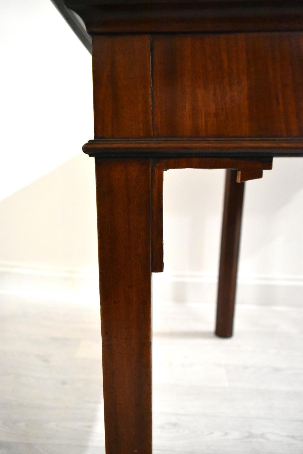 A George III mahogany rectangular fold over table raised on square supports. H.75.5 W.92.5 D.45. - Image 5 of 11