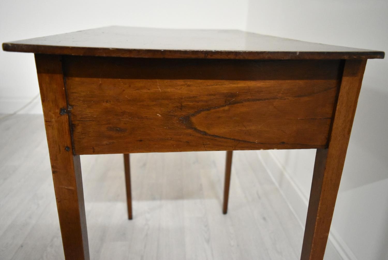 An Edwardian mahogany single drawer hall table raised on square tapering supports. H.76 W.77.5 D. - Image 6 of 7