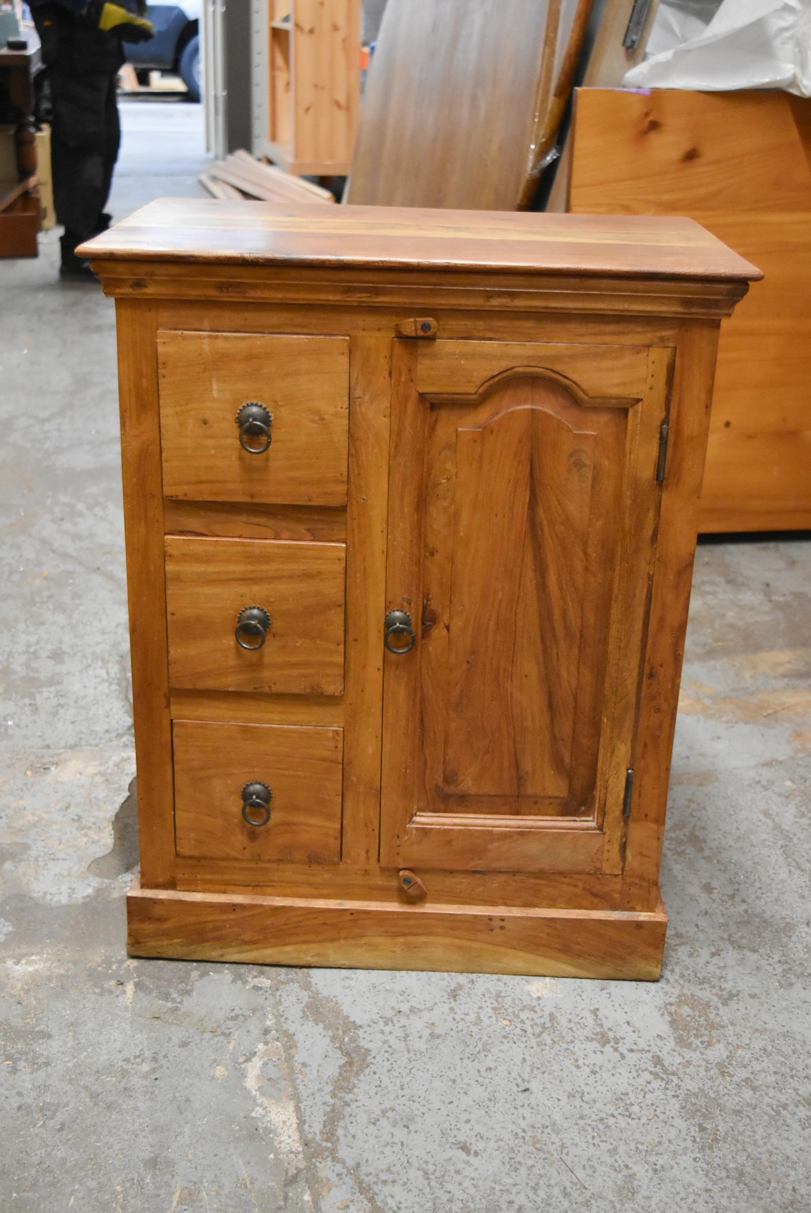 A small Eastern hardwood kitchen cabinet fitted with spice drawers and a panel door. H.76 x W.60 x
