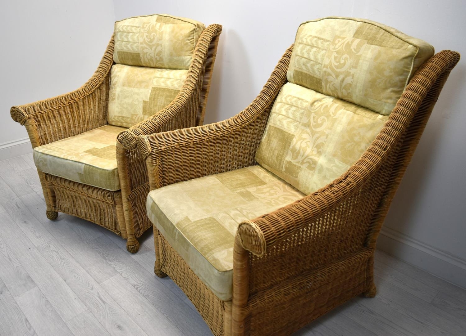 A pair of contemporary cane conservatory armchairs each with loose cushions. H.98 W.82cm - Image 2 of 5