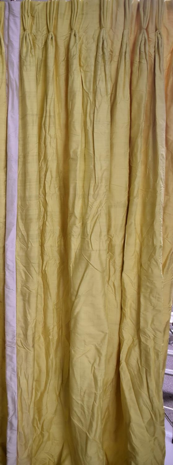 A single bright yellow silk pinch pleated interlined curtain. H.318 W.105cm