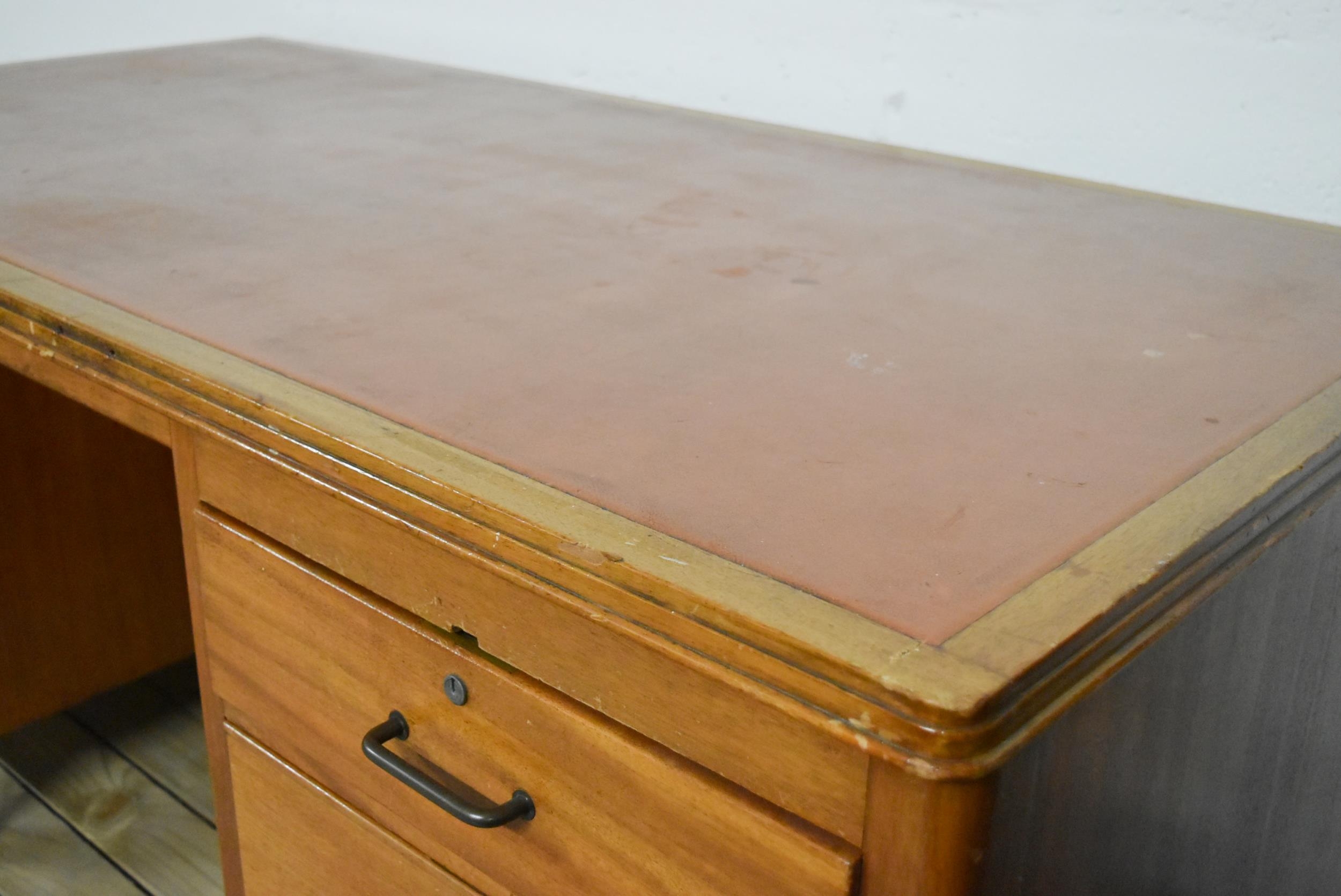 A mid century vintage teak pedestal desk with inset leather top on block supports. - Image 4 of 9
