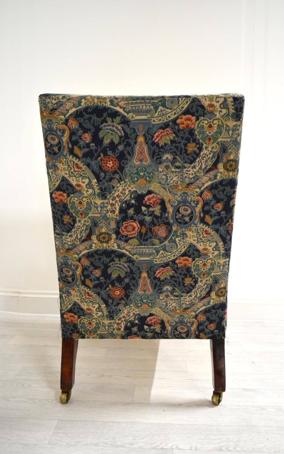 A late 19th / early 20th century mahogany framed and upholstered nursing chair raised on turned - Image 5 of 5