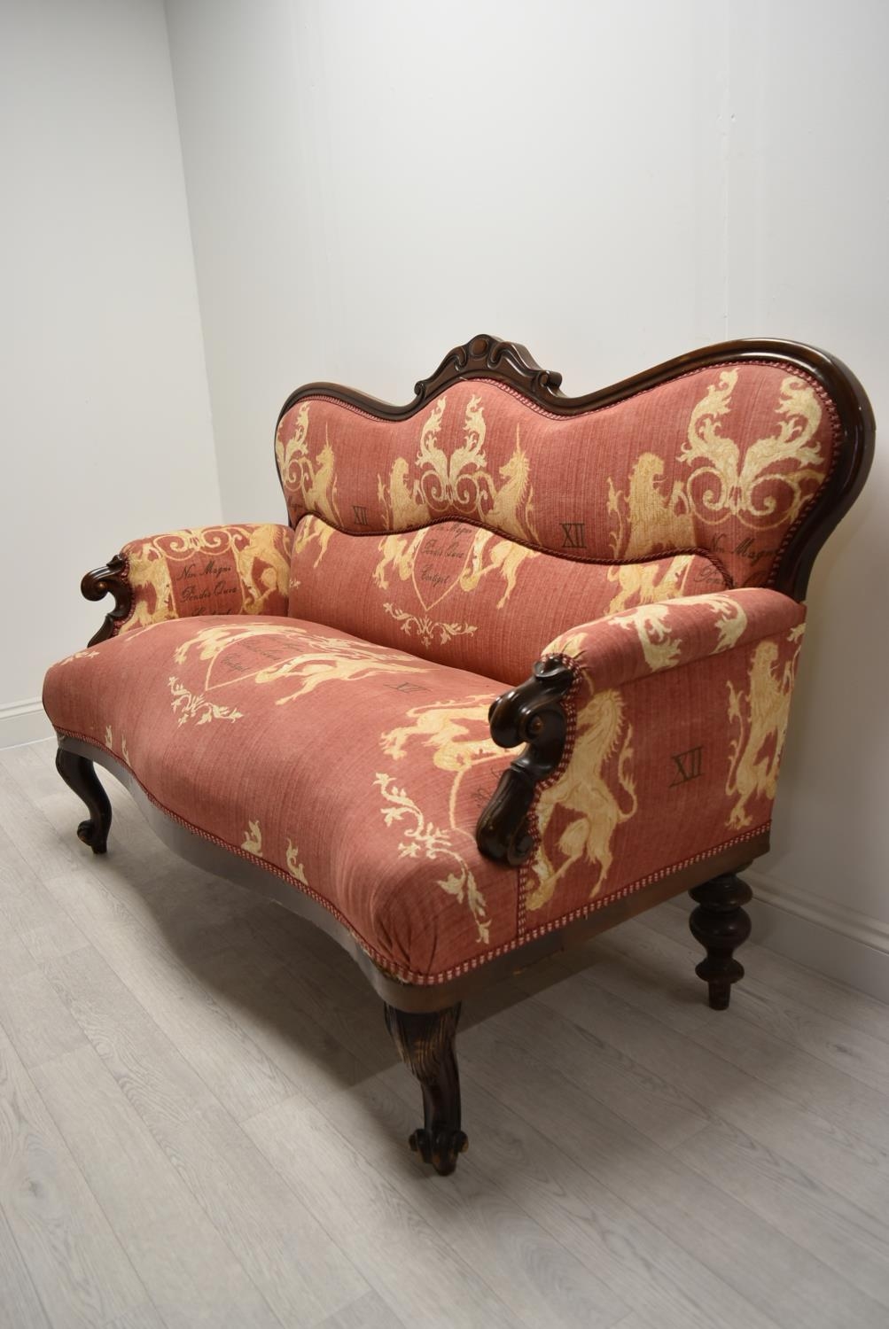 A late 19th / early 20th century mahogany framed French style settee with scroll arms raised on - Image 4 of 5