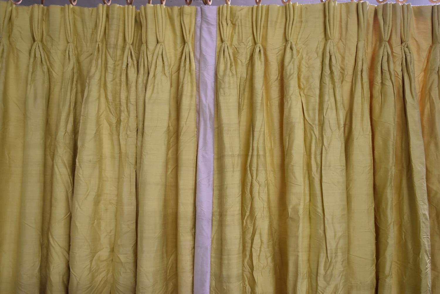 A pair of bright yellow silk pinch pleated interlined curtains. H.318 W.105cm - Image 2 of 6