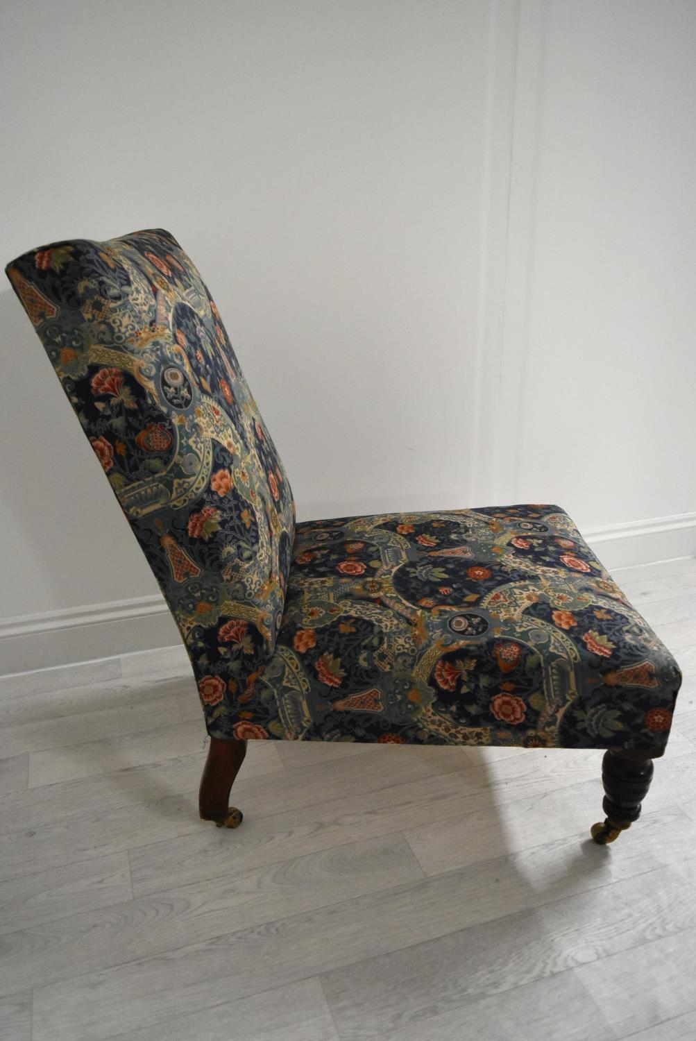 A late 19th / early 20th century mahogany framed and upholstered nursing chair raised on turned - Image 4 of 5