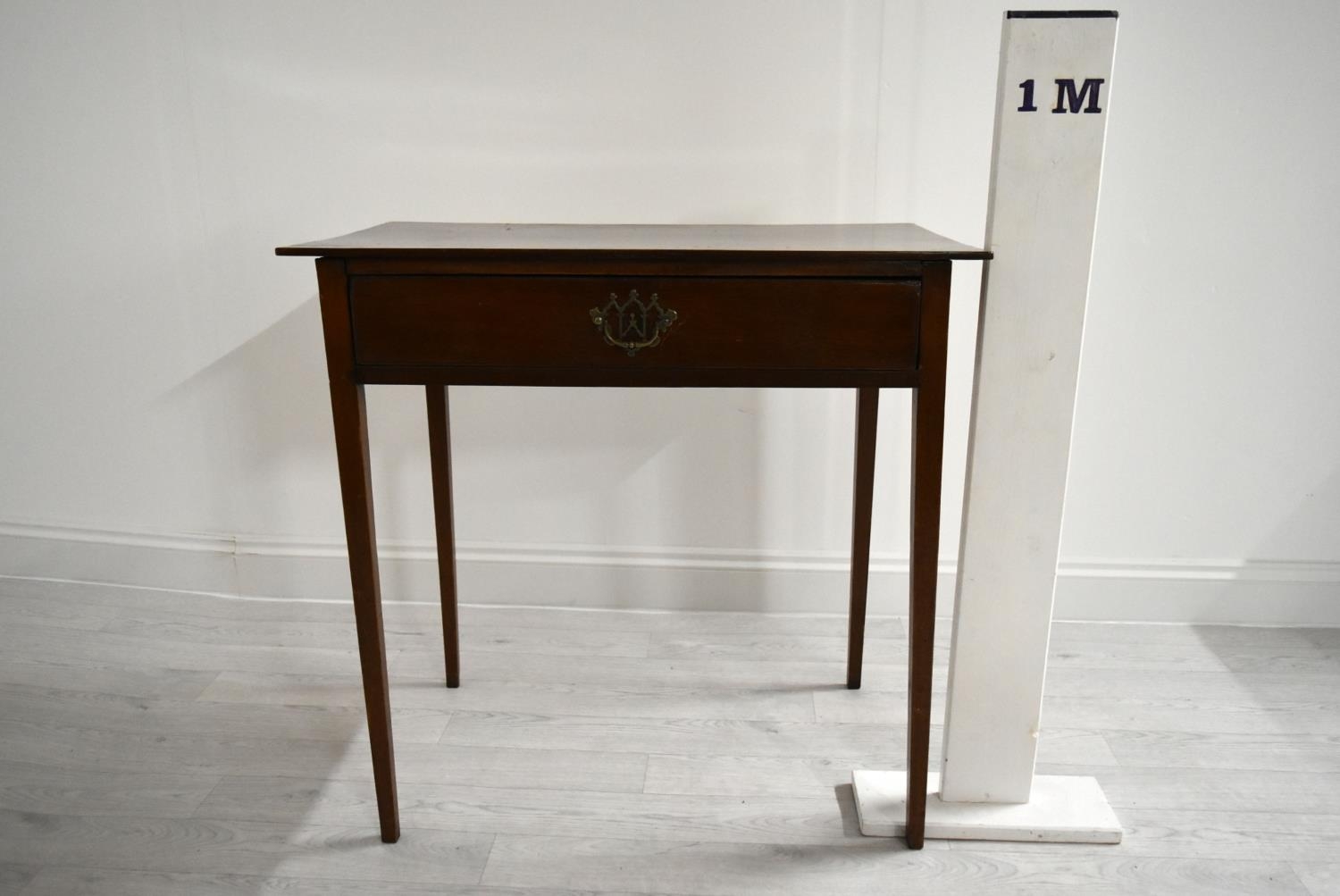 An Edwardian mahogany single drawer hall table raised on square tapering supports. H.76 W.77.5 D. - Image 7 of 7