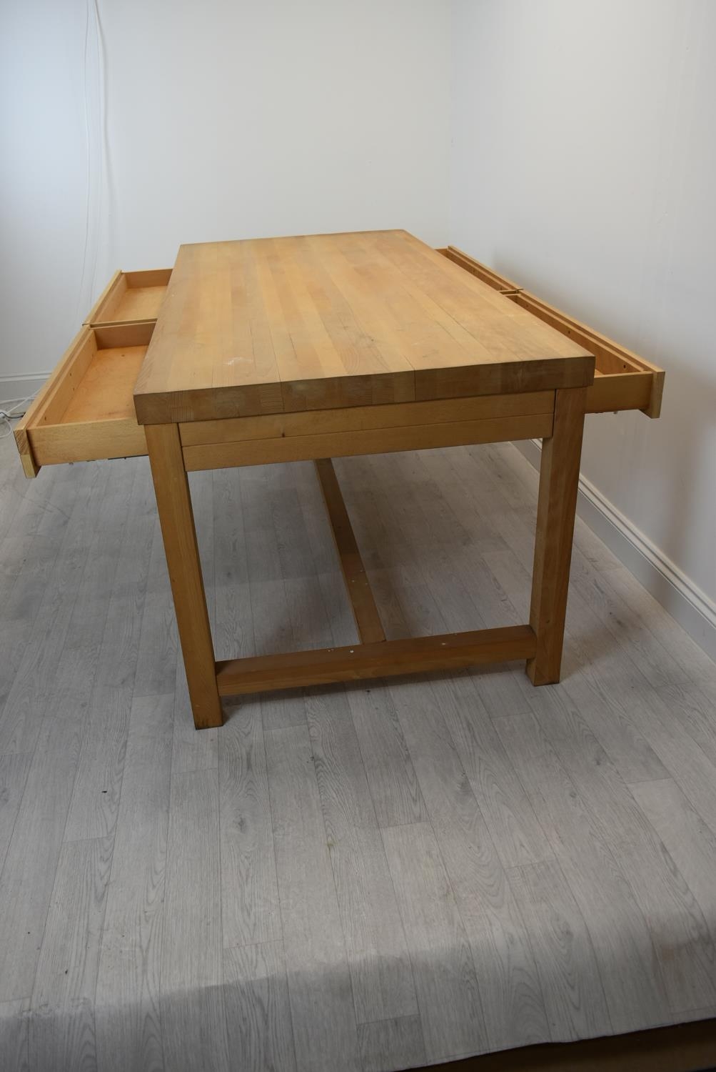 A contemporary oak four drawer refectory style table raised square supports united by a stretcher - Image 7 of 8