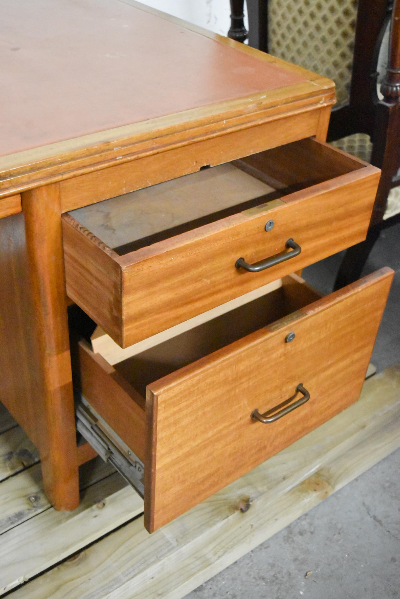 A mid century vintage teak pedestal desk with inset leather top on block supports. - Image 9 of 9