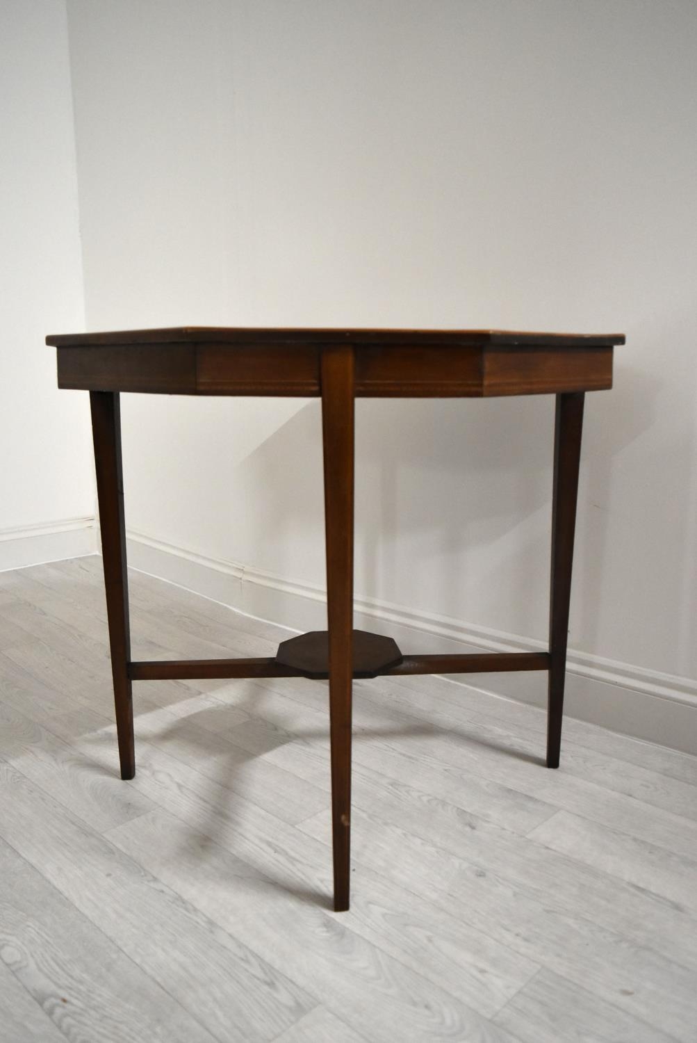 An Edwardian mahogany octagonal occasional table on tapering supports united by stretcher. H.68.5 - Image 3 of 17