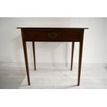 An Edwardian mahogany single drawer hall table raised on square tapering supports. H.76 W.77.5 D.