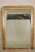 A 19th century gilt painted arch topped overmantle mirror. H.140 W.101cm.