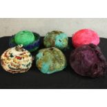 A collection of six 20th century style feathered women’s hats.