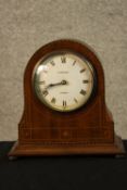An Edwardian J.W. Benson inlaid walnut cased drum head mantle clock, the white painted dial with