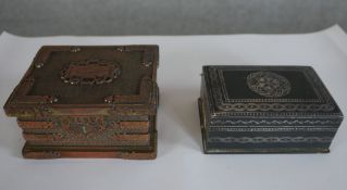 A 20th century Indian bidri style box and cover, together one other box and cover. H.5 W.10 D.8cm