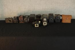 A mixed collection of old cameras. Some folding and made by Ensign. Complete with their original