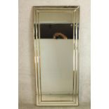 A contemporary Art Deco style mirror framed rectangular wall hanging mirror. H.156 W.68cm.