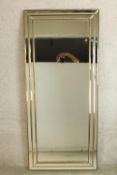 A contemporary Art Deco style mirror framed rectangular wall hanging mirror. H.156 W.68cm.