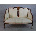 An Edwardian inlaid mahogany show framed upholstered two seater settee with pierced splat back