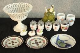 Assorted porcelain to include a Royal Doulton porcelain figure, various Royal Worcester egg coddlers
