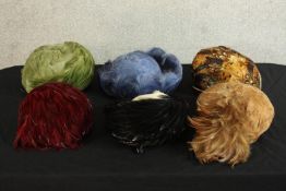 A collection of six assorted 20th century ladies feathered hats.