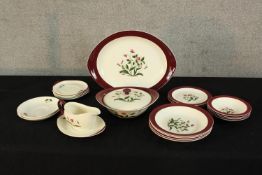 A contemporary Wedgwood Mayfield part dinner set to include plates and sauceboat. L.40cm. (largest).