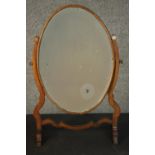 A 19th century mahogany framed dressing table dressing table mirror raised on trestle style