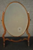 A 19th century mahogany framed dressing table dressing table mirror raised on trestle style