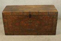 A 19th century, possibly Tibetan, polychrome hardwood twin handled carrying trunk, with applied