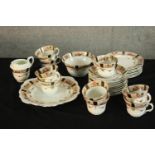 A late 19th century Balmoral China part teaset, to include cups, plates and saucers with floral