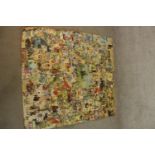 A large scrapscreen collage made from 19th century and later scraps. L.155 W.108cm.