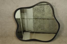 A contemporary black framed wall mirror. H.97 W.100cm.