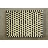 A contemporary rectangular black and white geometric pattern gallery tray. L.61 W.46cm.