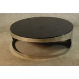 After Gallotti & Radice, a contemporary stainless steel and glass topped 'Tab' circular occasional