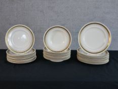 Assortment of 20th century New Chelsea white painted porcelain plates and soup bowls with gold