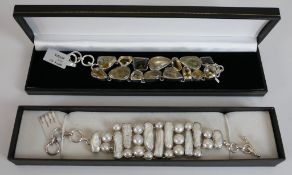 Two boxed gemstone bracelets, including a Biwa and white pearl articulated bracelet with loop and